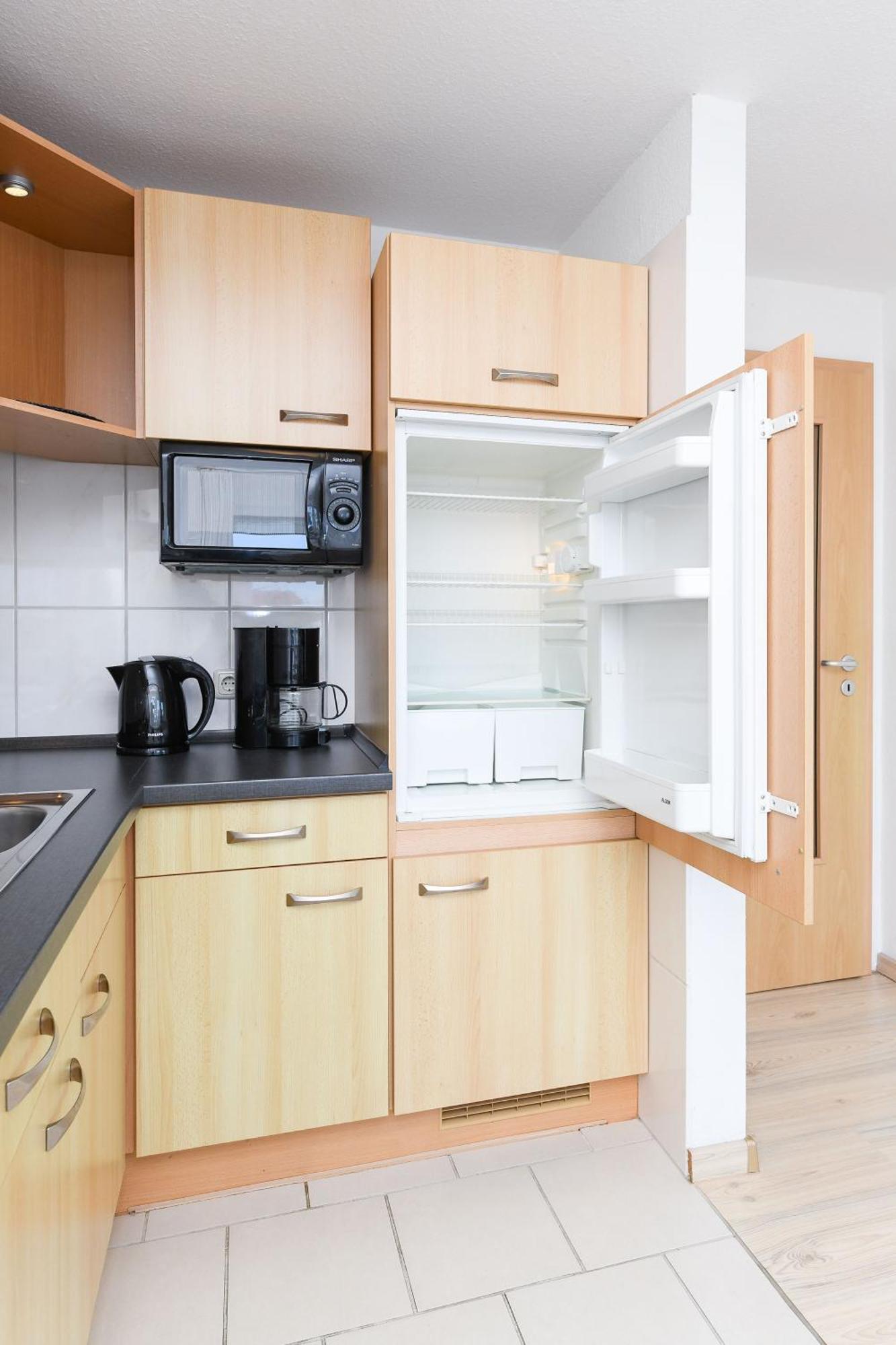 Haus Hafenblick Apartment Bensersiel Bagian luar foto